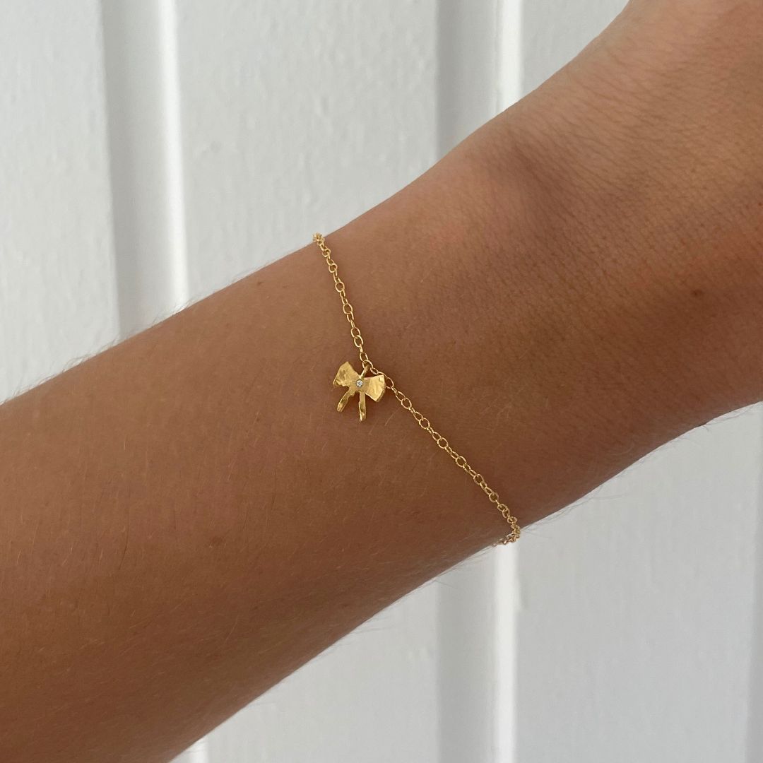 Petit rosett armband med sten