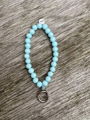 Nyckelring i trä blå